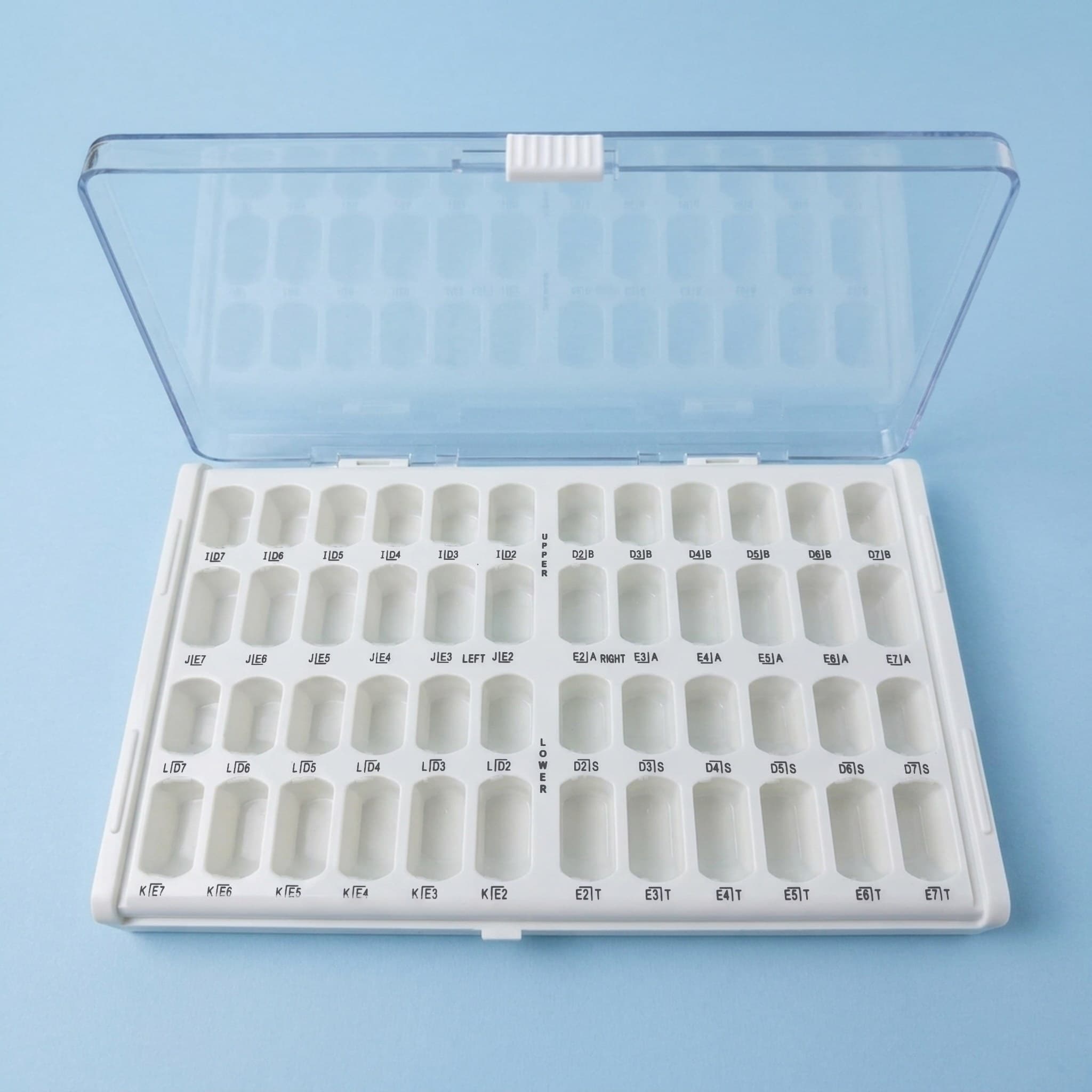 KTR primary molar crown carry case, open, with labeled slots for each molar and size